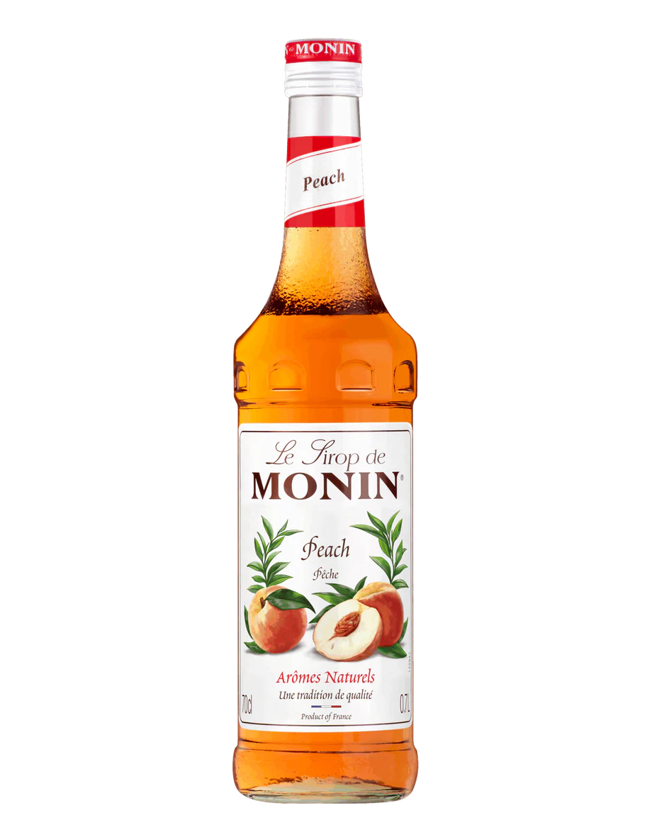MONIN sirup Broskev 0,7l — láhev barového sirupu